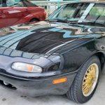 各スピーカーやボディソニックを流用し、市販地デジナビを取り付けした、ユーノスロードスター(NA6)センソリーサウンドシステム付車