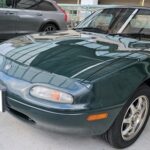 市販ディスプレイオーディオへの付け替えを実施した、ユーノスロードスター(NA型)センソリーサウンド付車